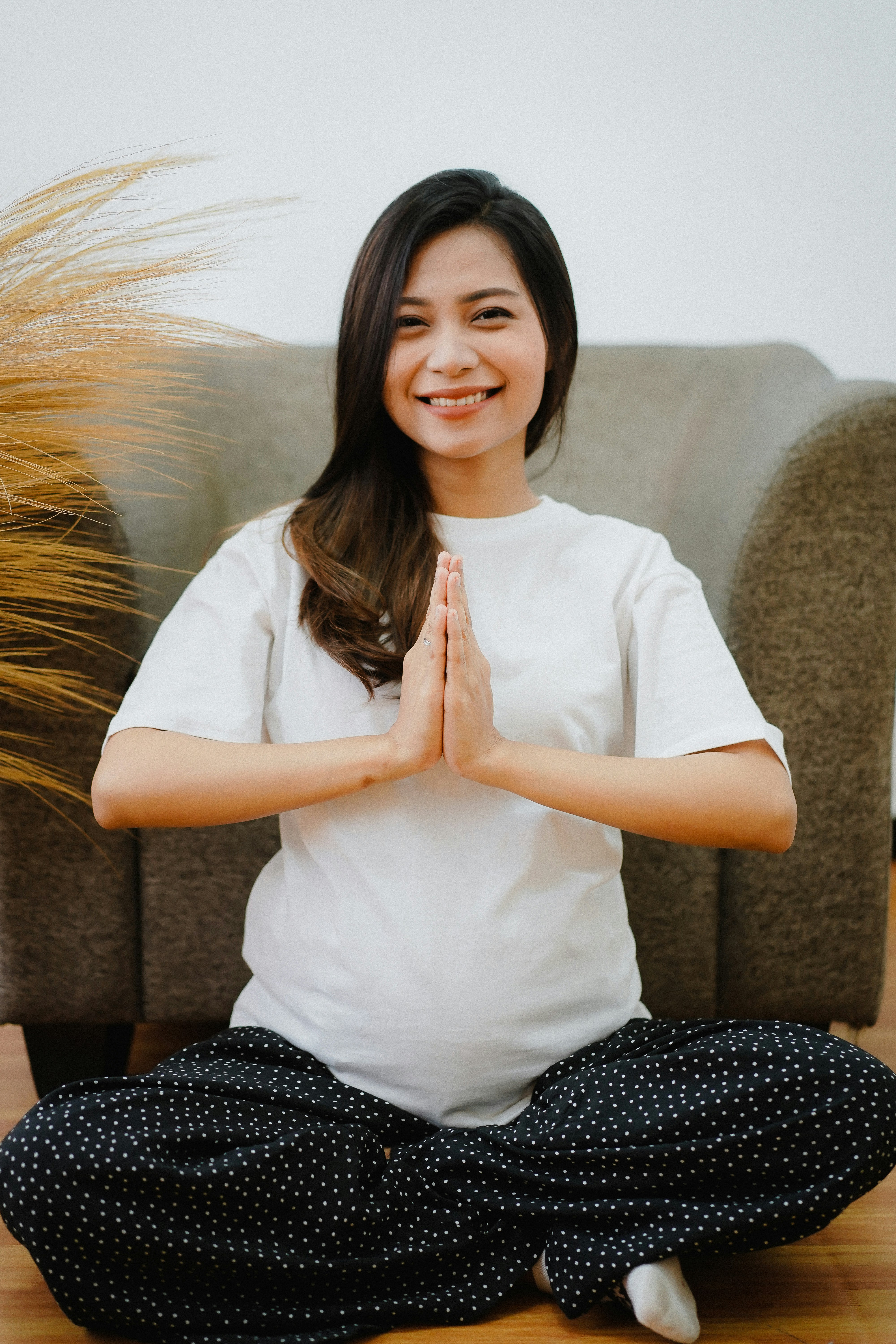 Pregnant woman doing yoga